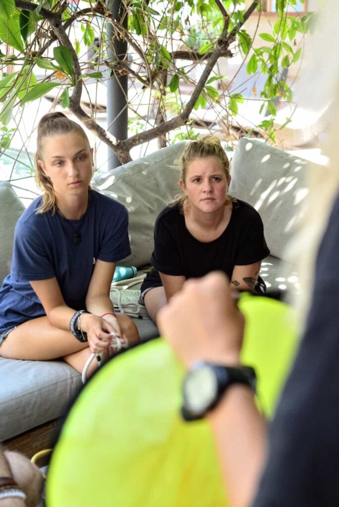 Divemaster trainees learning about search and recovery techniques