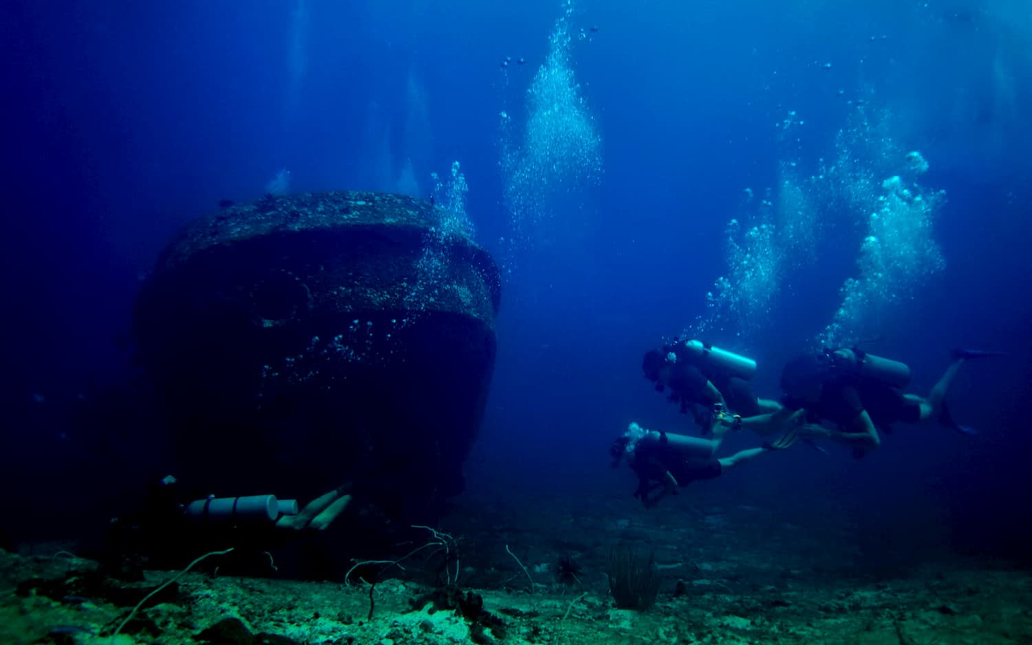 Guided Boat Dive around the Gili Islands. All Divesites are 10 - 15 minutes from Trawangan Dive. In this picture Shark Point with the Wreck