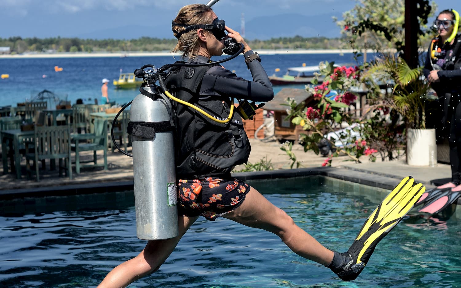 PADI Course Director Holly Macleod showing her candidates how to do a perfect giant stride