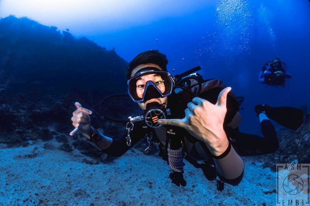 Scuba Diver showing his style underwater